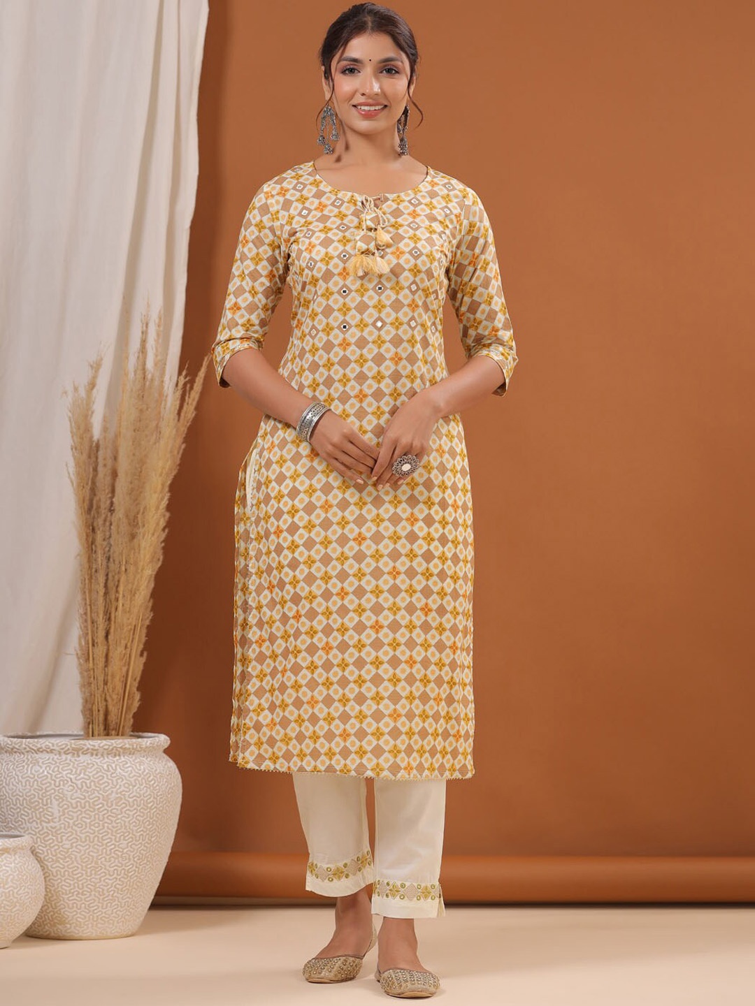 

Meena Bazaar Ethnic Motifs Printed Regular Mirror Work Kurta With Trousers, Yellow