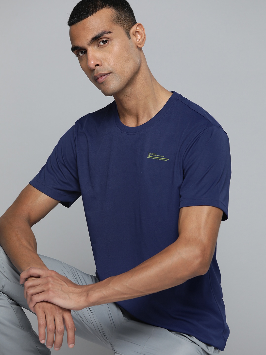 

HRX by Hrithik Roshan Solid Rapid-Dry Minimal Printed Training T-shirt, Navy blue