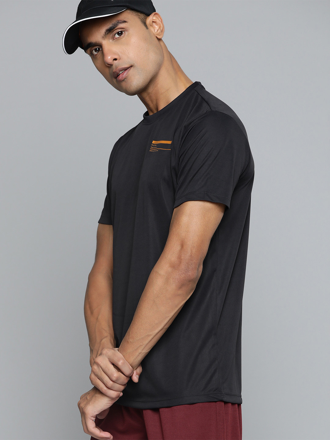 

HRX by Hrithik Roshan Solid Rapid-Dry Minimal Printed Training T-shirt, Black