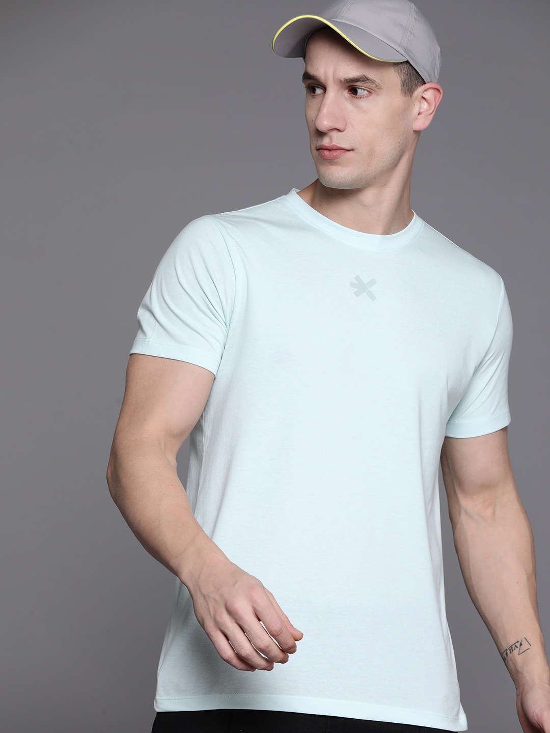 

HRX by Hrithik Roshan Men Solid T-shirt, Blue
