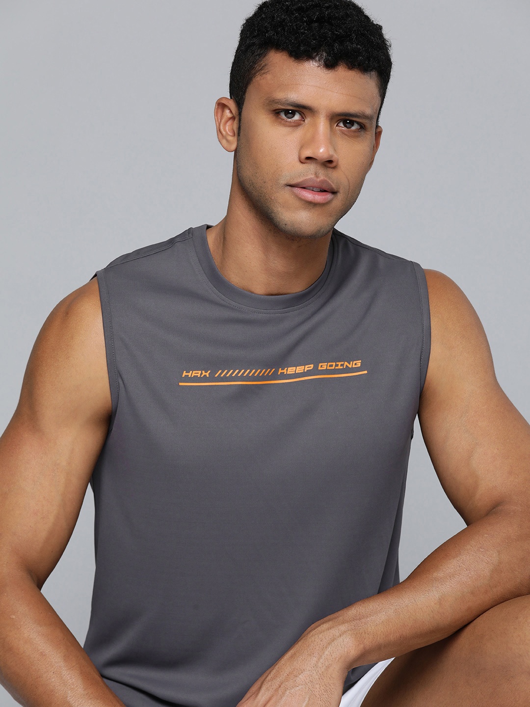 

HRX by Hrithik Roshan Men Charcoal & Orange Typography Printed T-shirt