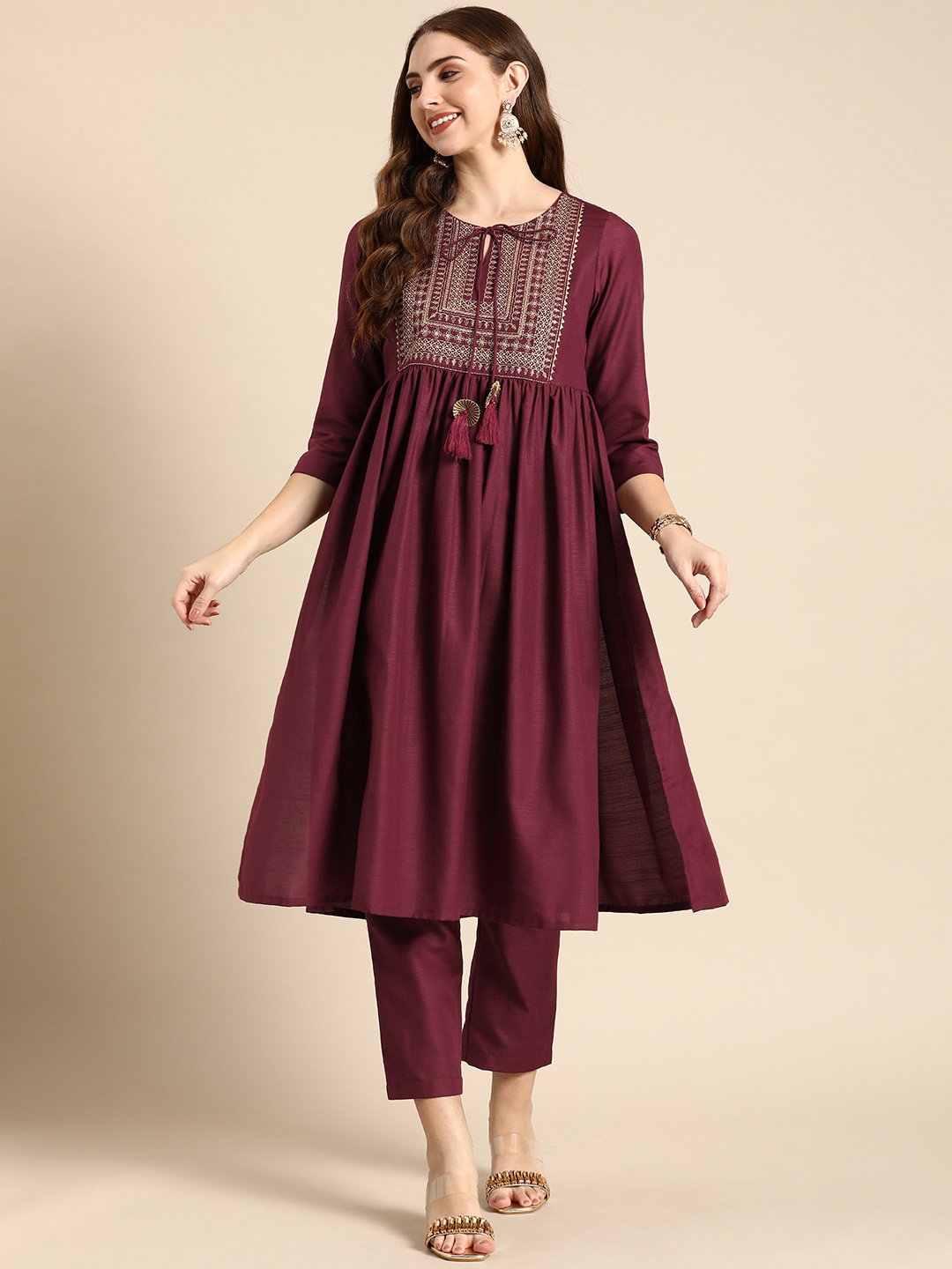 

Anouk Ethnic Motifs Thread Work Tie-Up Neck Kurta with Trousers, Maroon