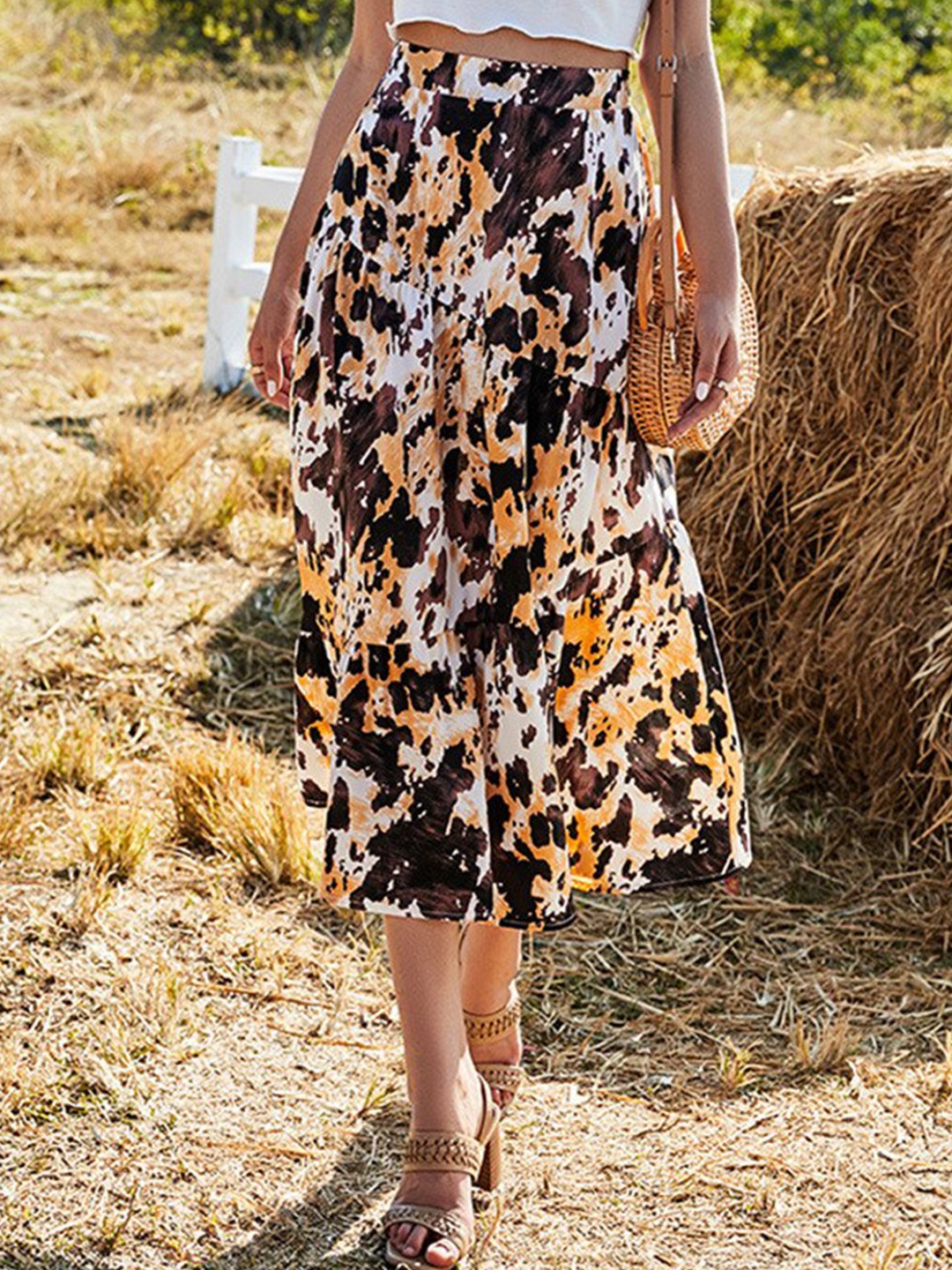 

StyleCast White Abstract Printed Flared Midi Skirts