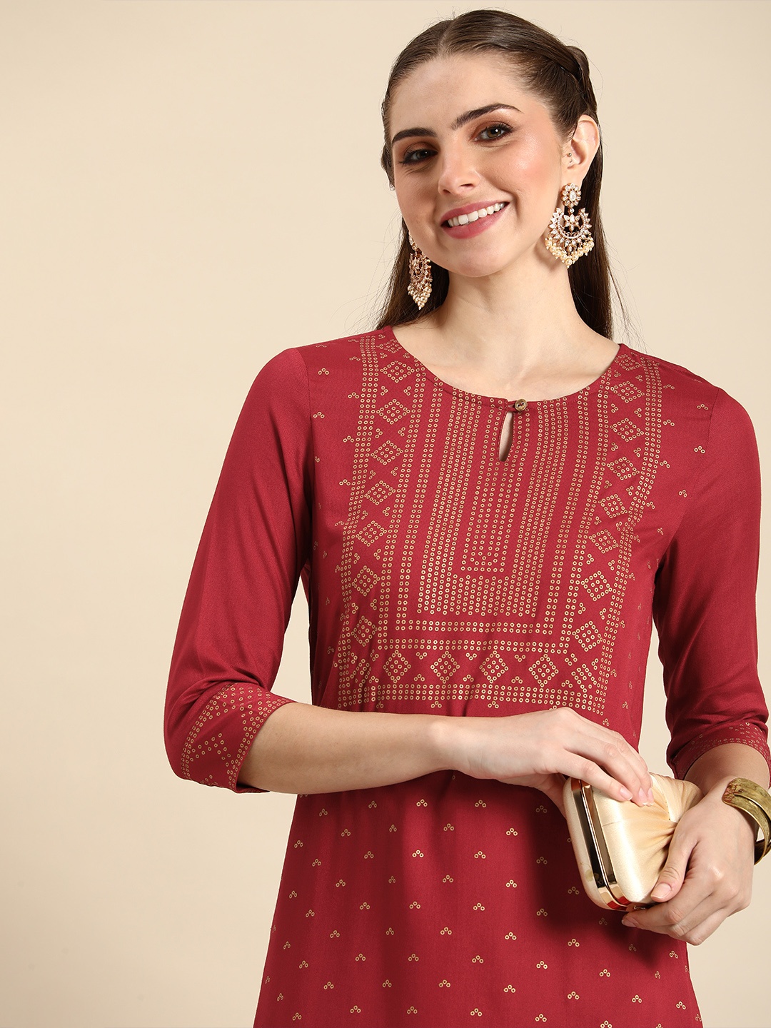 

Anouk Geometric Printed Keyhole Neck Straight Kurta, Maroon