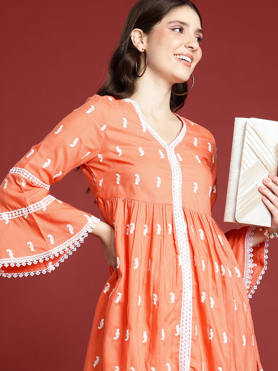 

Anouk Ethnic Motifs Embroidered Kurti with Sharara, Peach