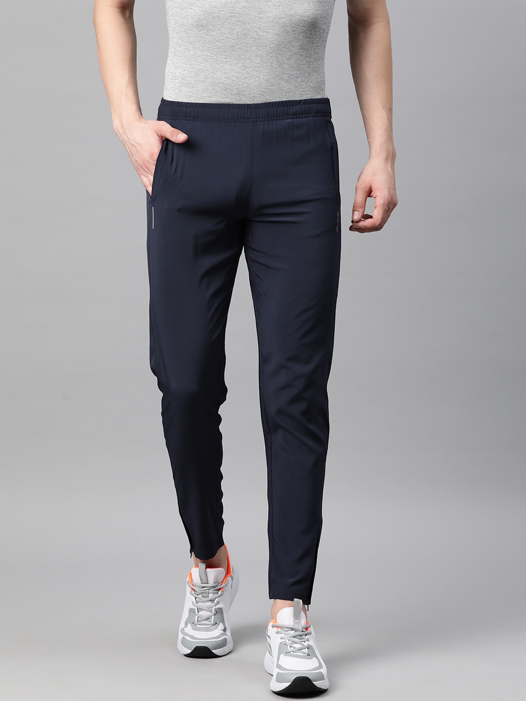 

Alcis Men Dry Tech Slim Fit Sports Track Pants with Reflective Detail, Navy blue
