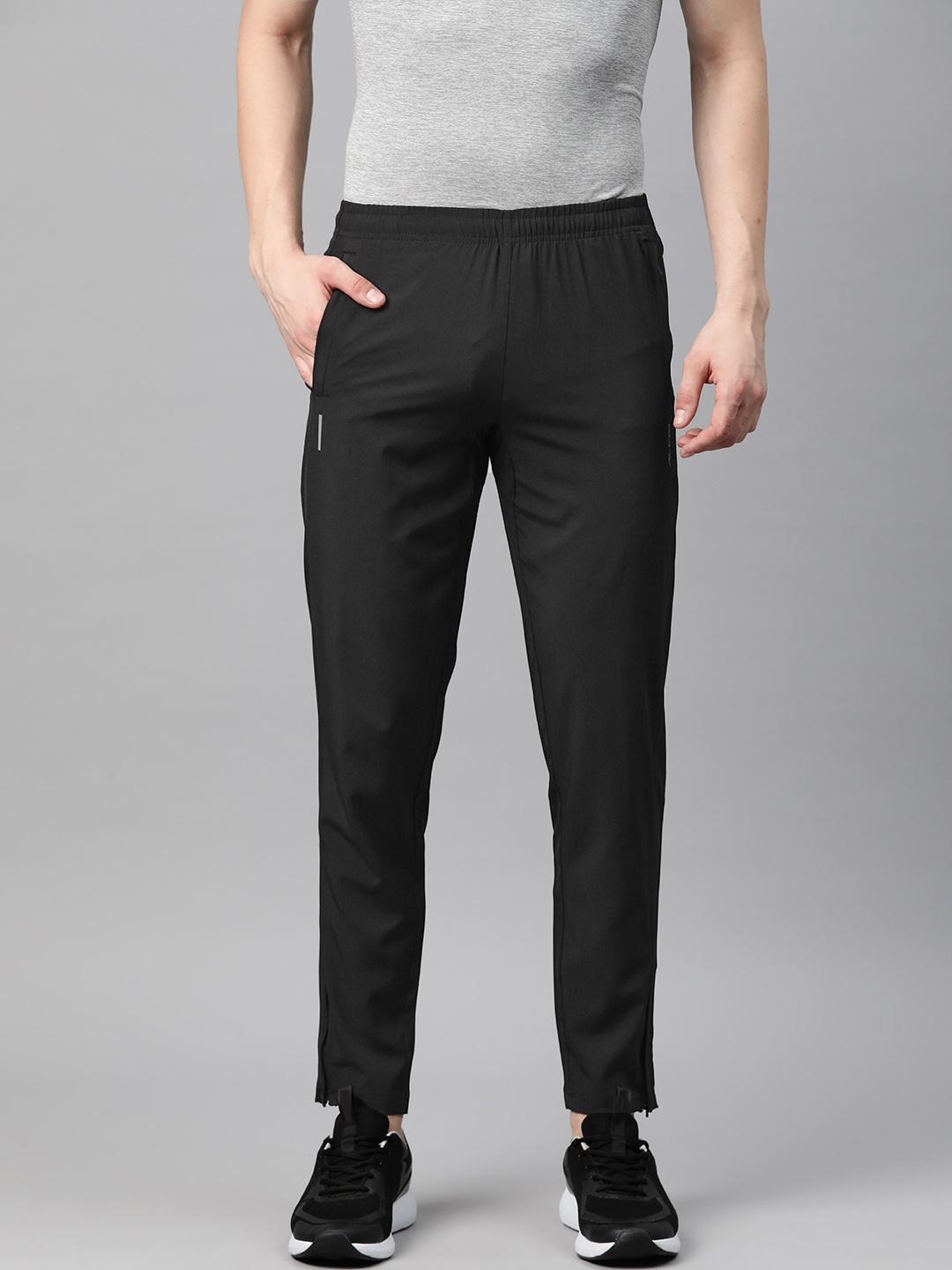

Alcis Men Dry Tech Slim Fit Sports Track Pants with Reflective Detail, Black