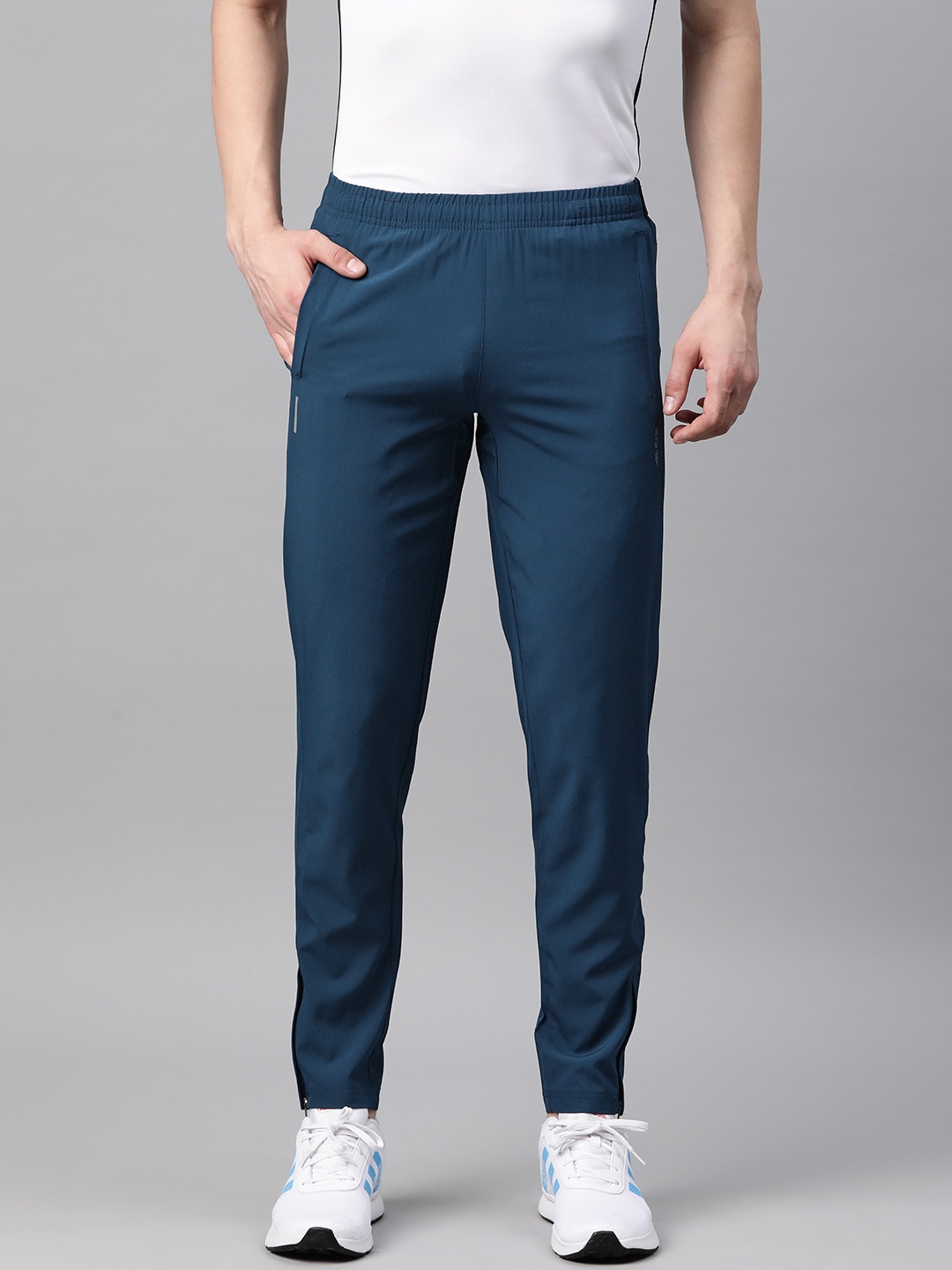 

Alcis Men Dry Tech Slim Fit Sports Track Pants with Reflective Detail, Blue