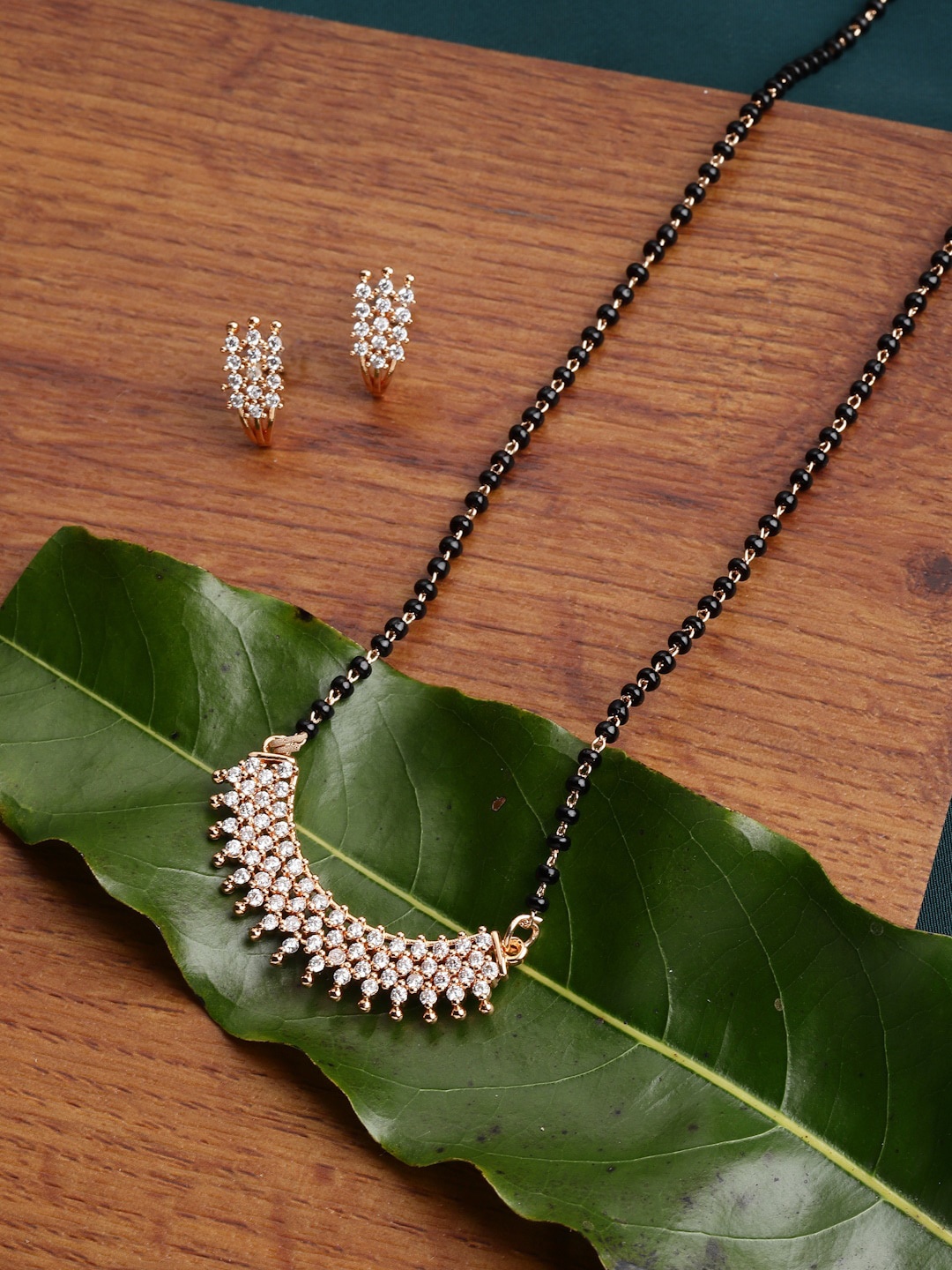 

PANASH Gold-Plated Stone-Studded & Beaded Mangalsutra With Earrings