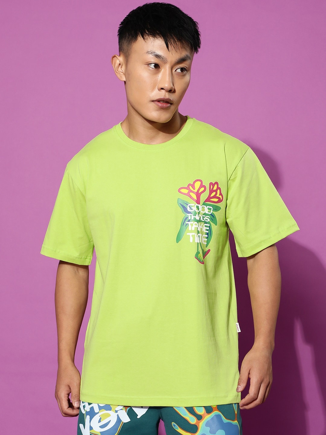 

VEIRDO Lime Green Typography Printed Pure Cotton Oversized T-shirt