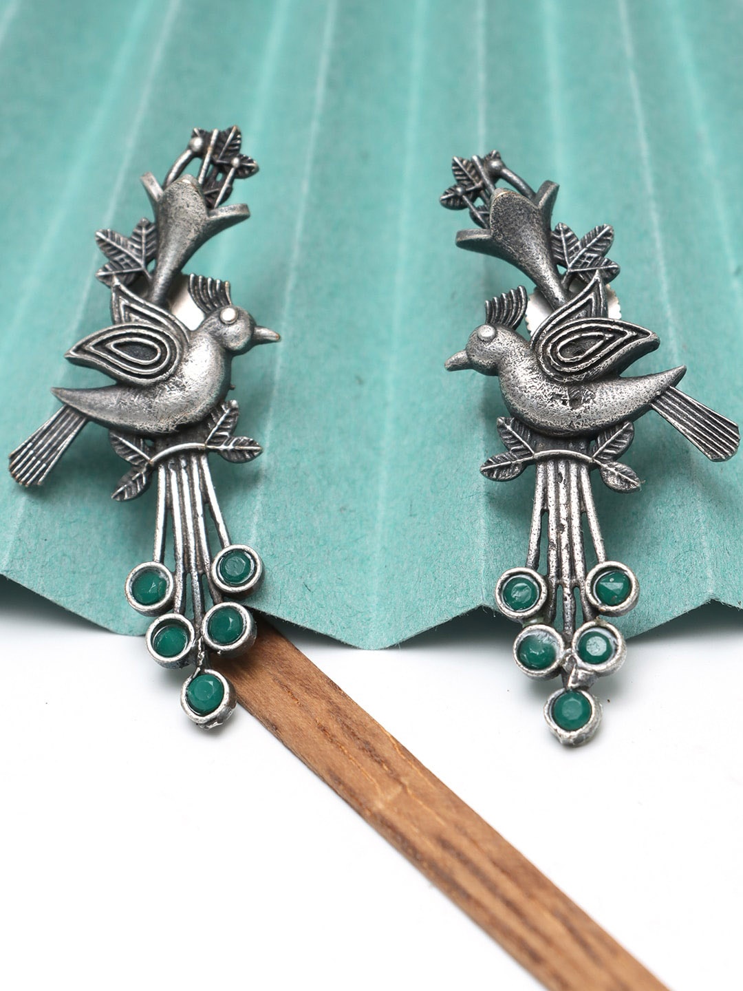 

Ozanoo Silver-Plated Peacock Stone Studded Drop Earrings, Green