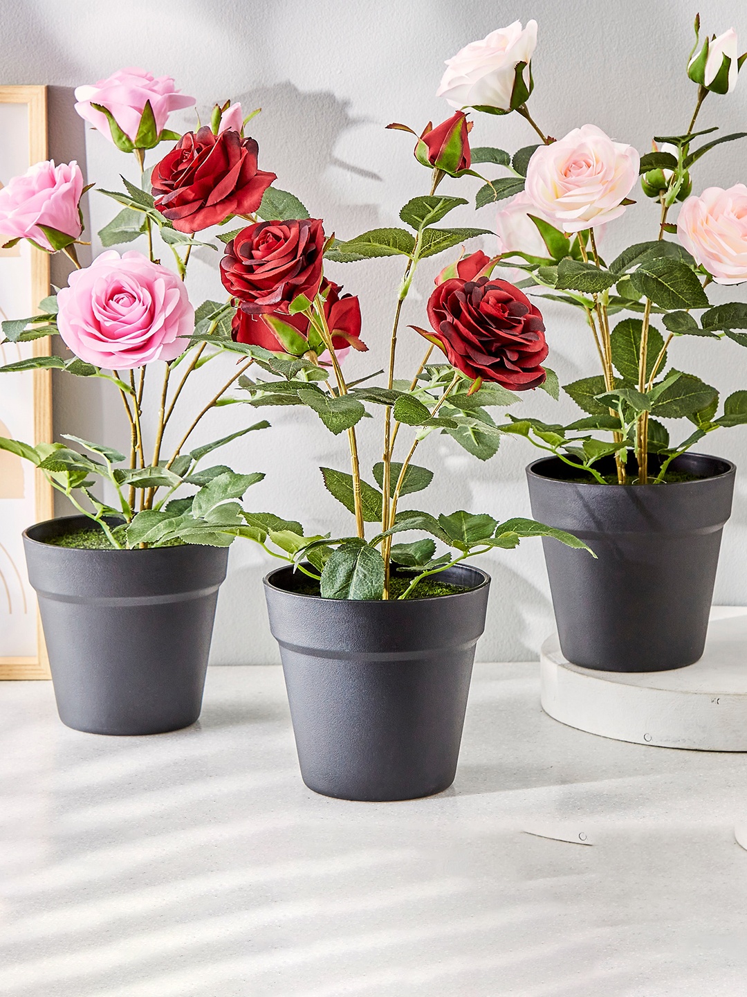 

Home Centre Red Rose Artificial Potted Plant