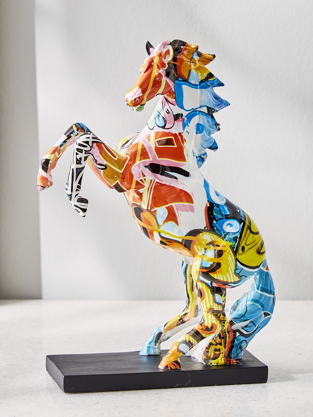 

Home Centre Blue Textured Horse Figurine Showpiece