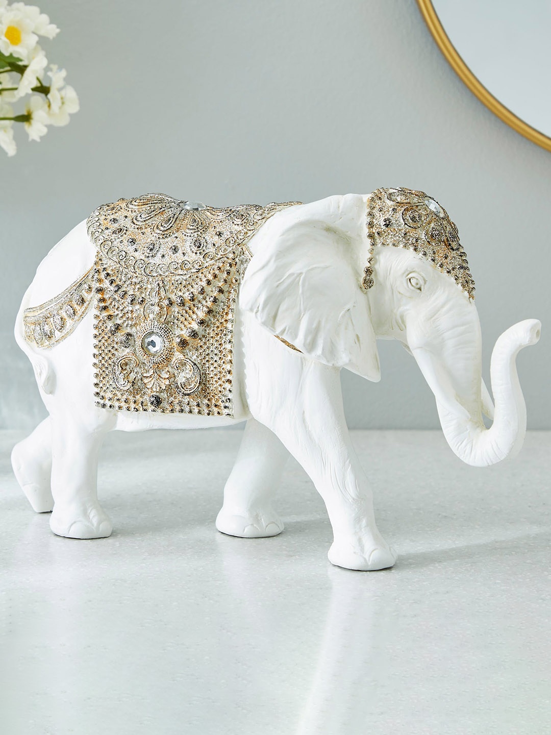 

Home Centre White Walking Elephant Figurine Showpiece