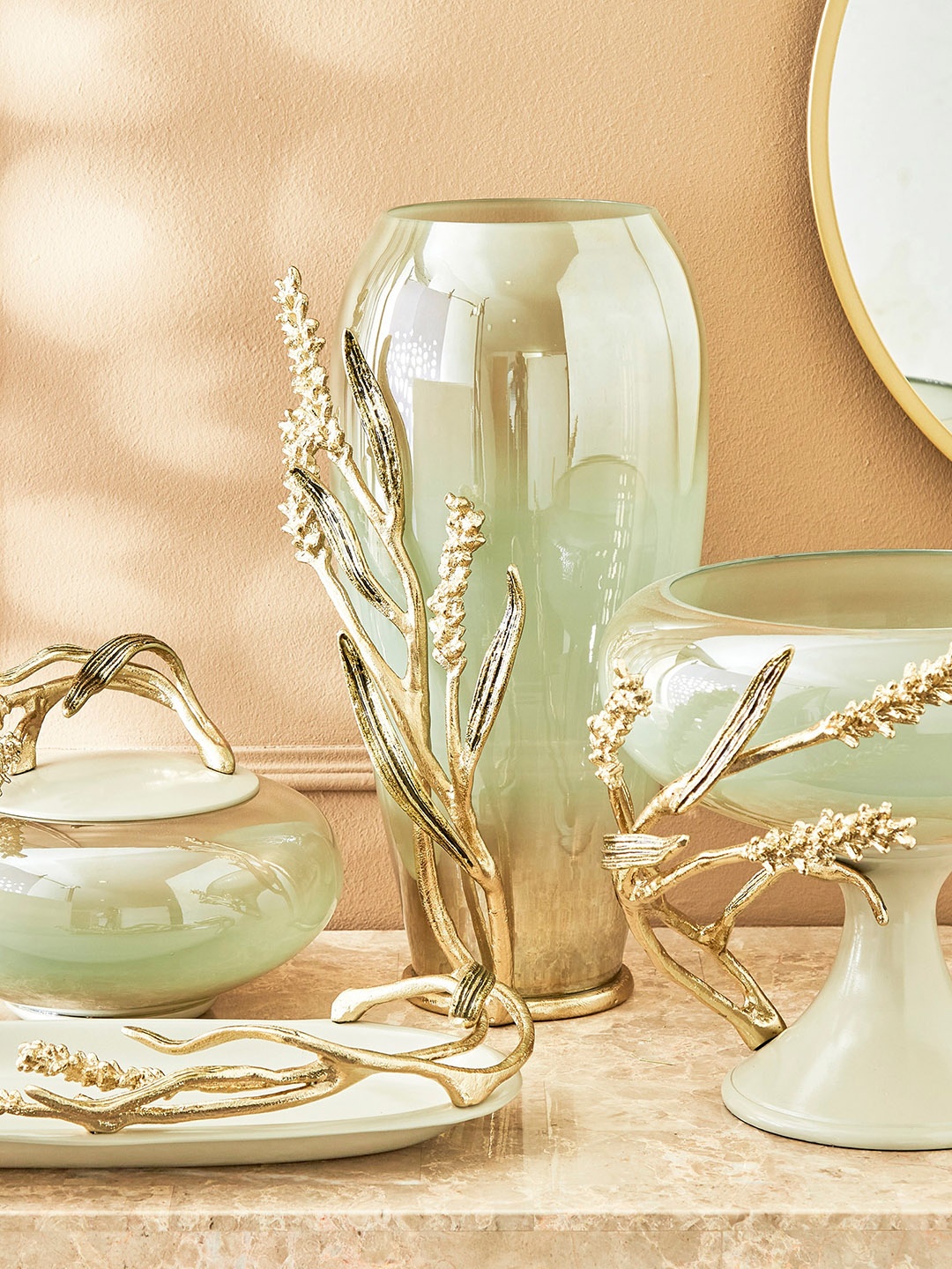 

Home Centre Green Decorative Canister Showpiece