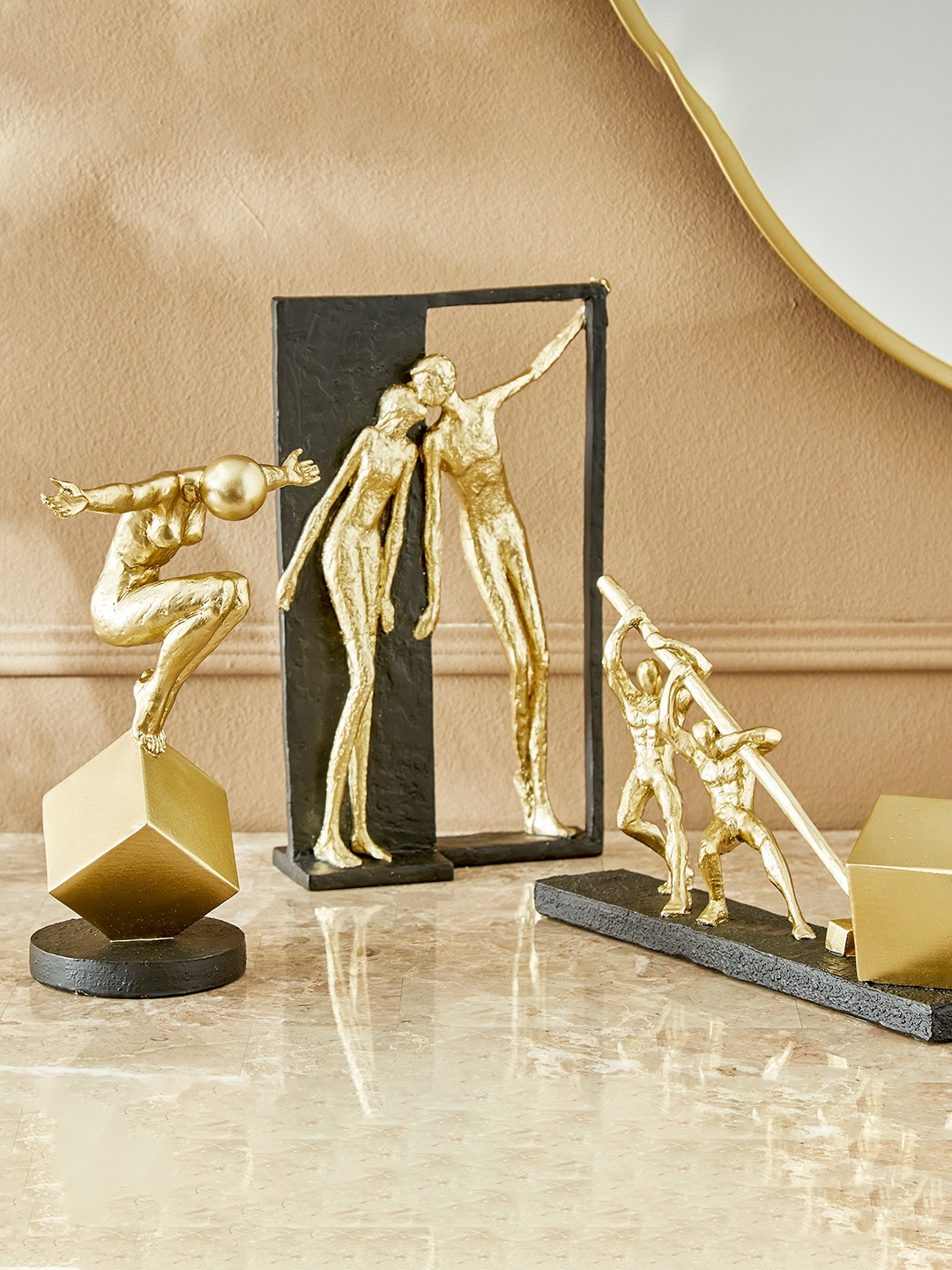 

Home Centre Golden & Black Human Cube Lifting Figurine Showpiece, Gold