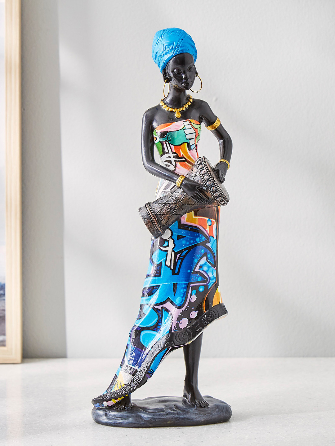 

Home Centre Blue & Black African Doumbek Figurine Showpieces