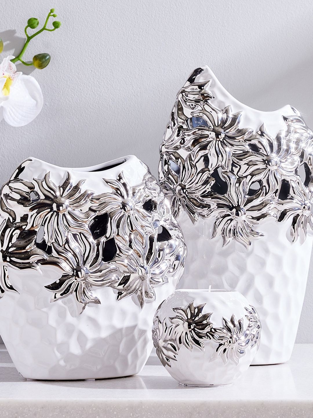 

Home Centre White Textured Luster Votive Holder