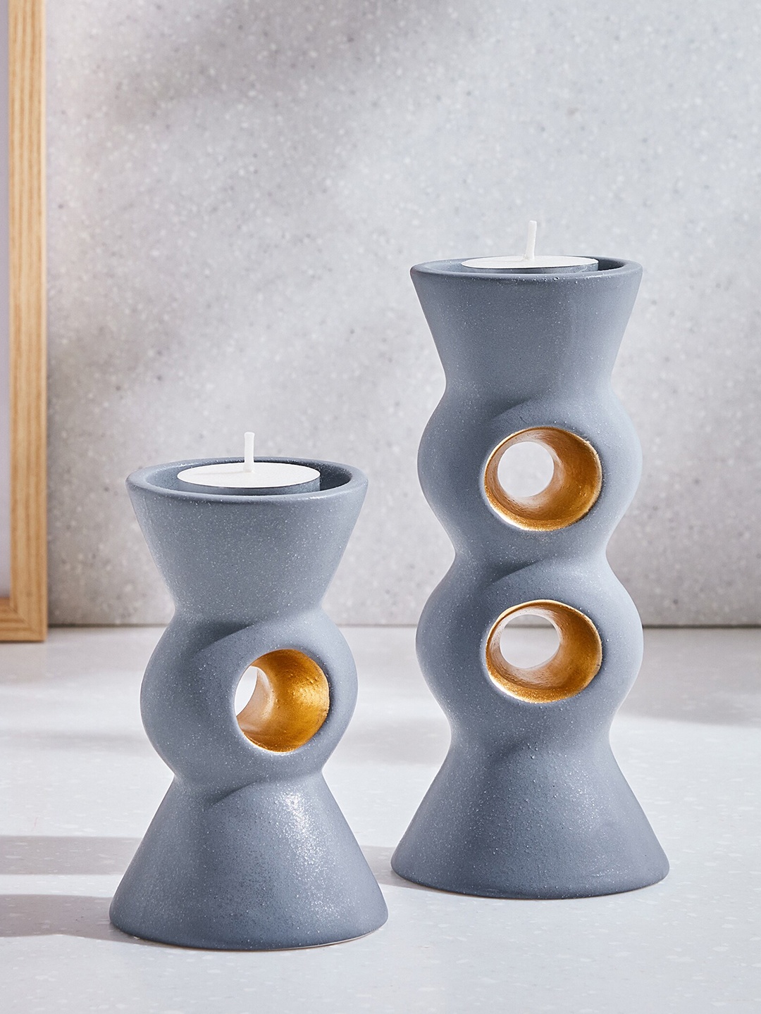 

Home Centre Marshmallow Grey Ceramic Candle Holder