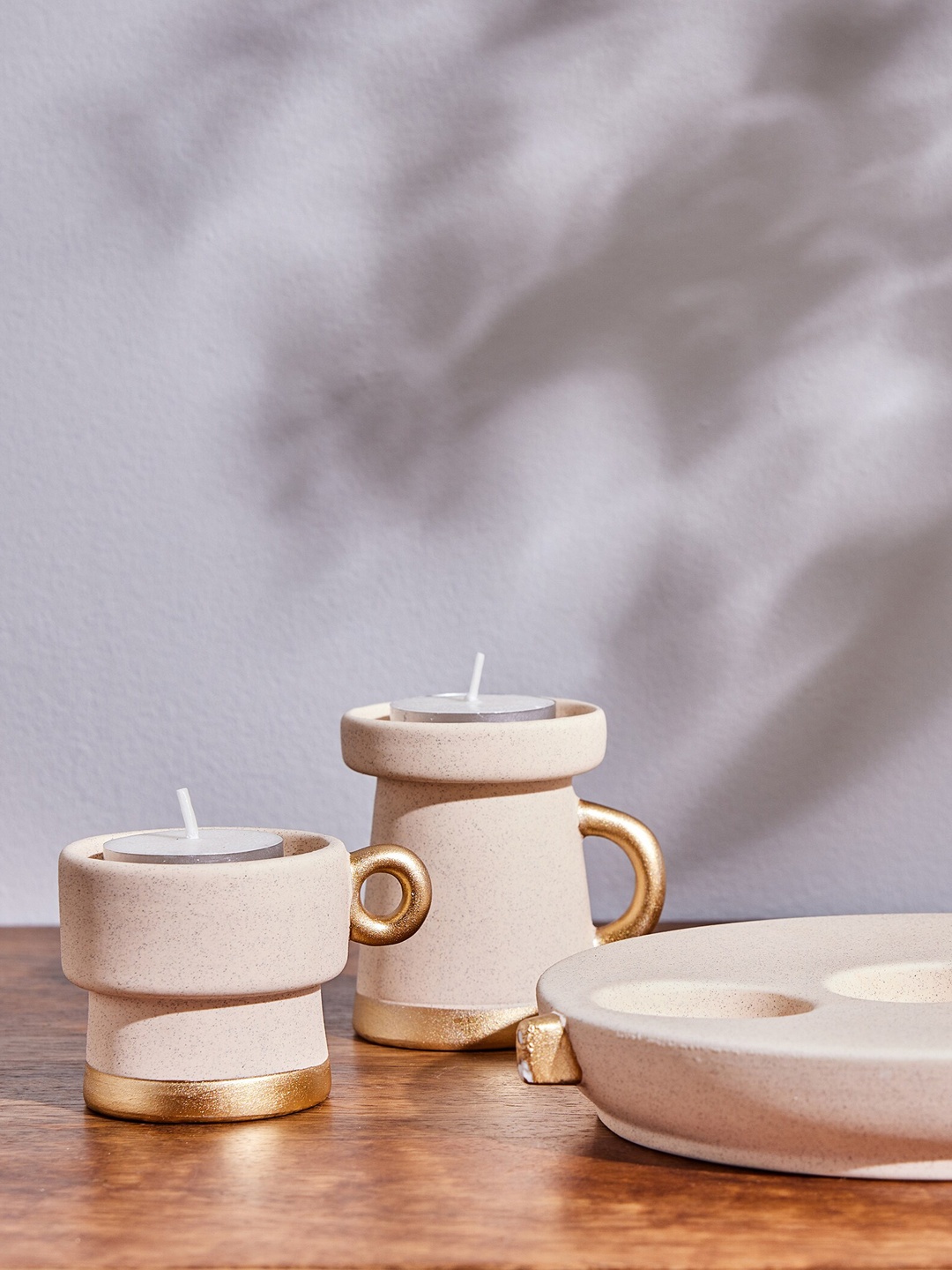 

Home Centre Marshmallow Beige Ceramic Candle Holder