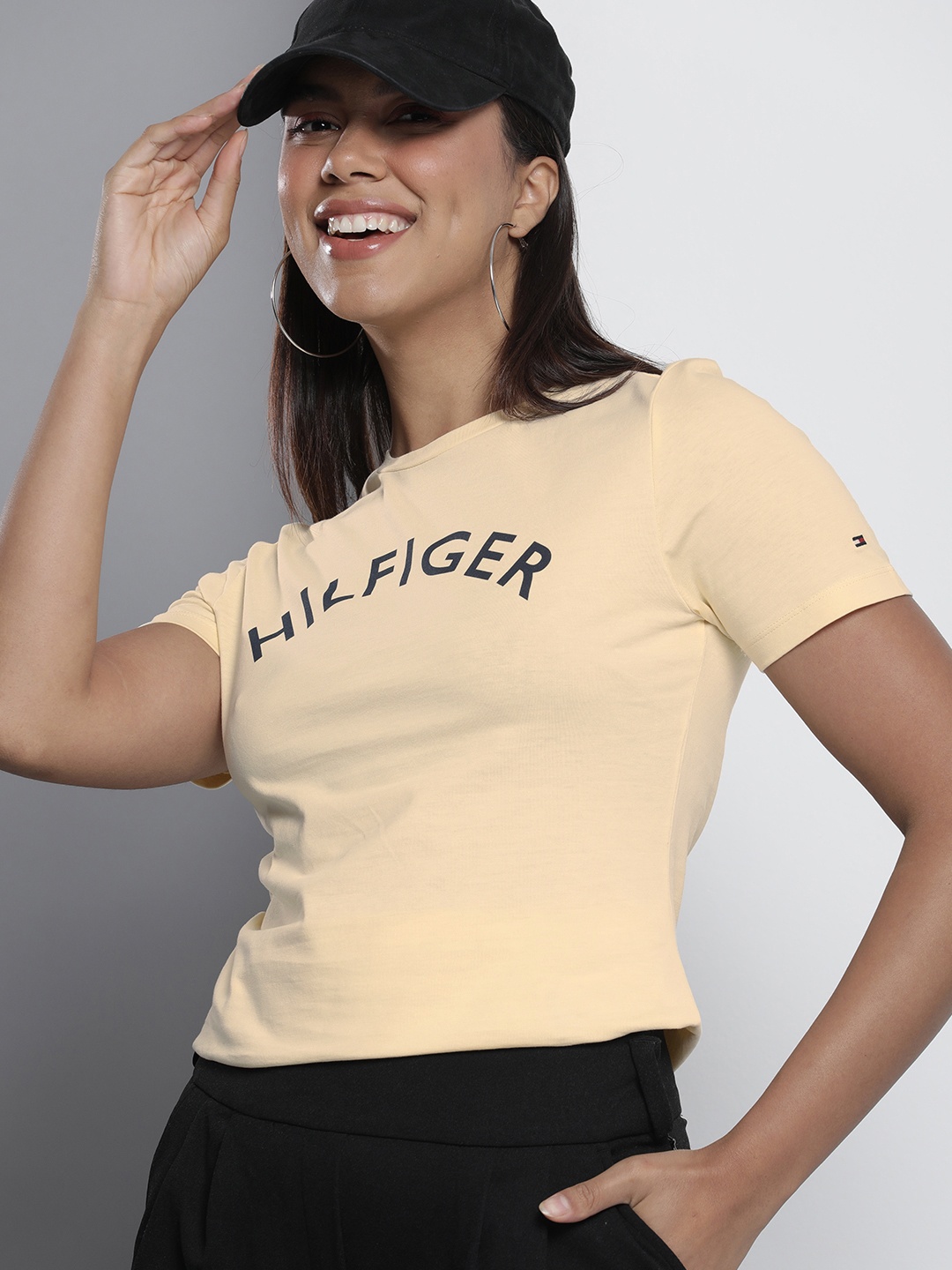 

Tommy Hilfiger Typography Printed Pure Cotton Slim Fit T-shirt, Yellow