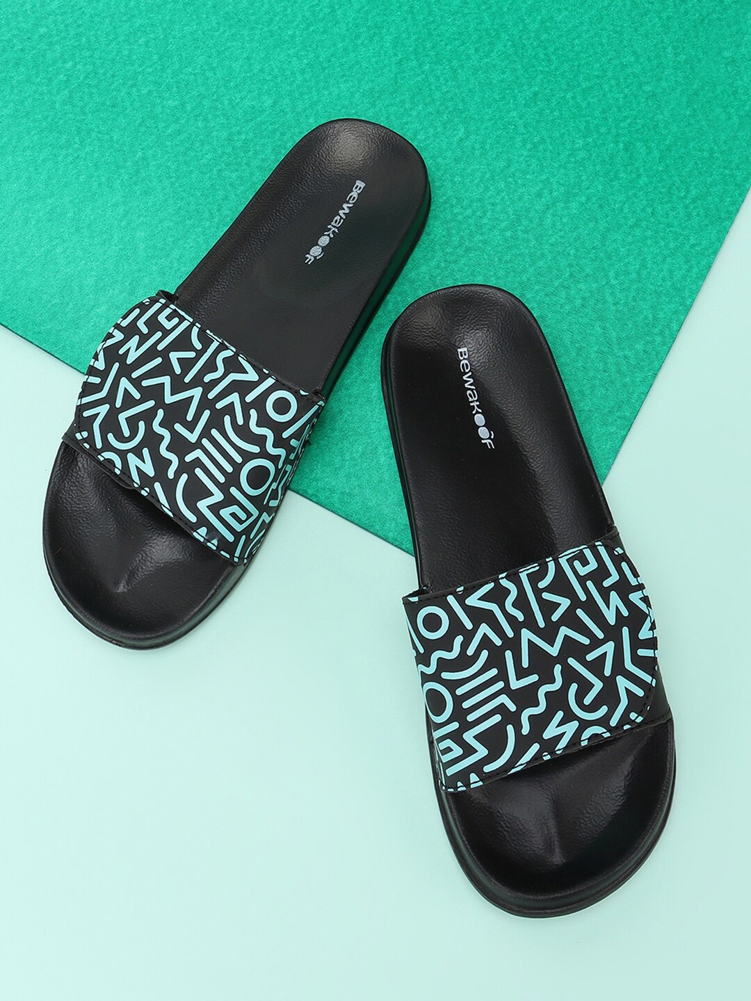 

Bewakoof Women Printed Rubber Sliders, Blue