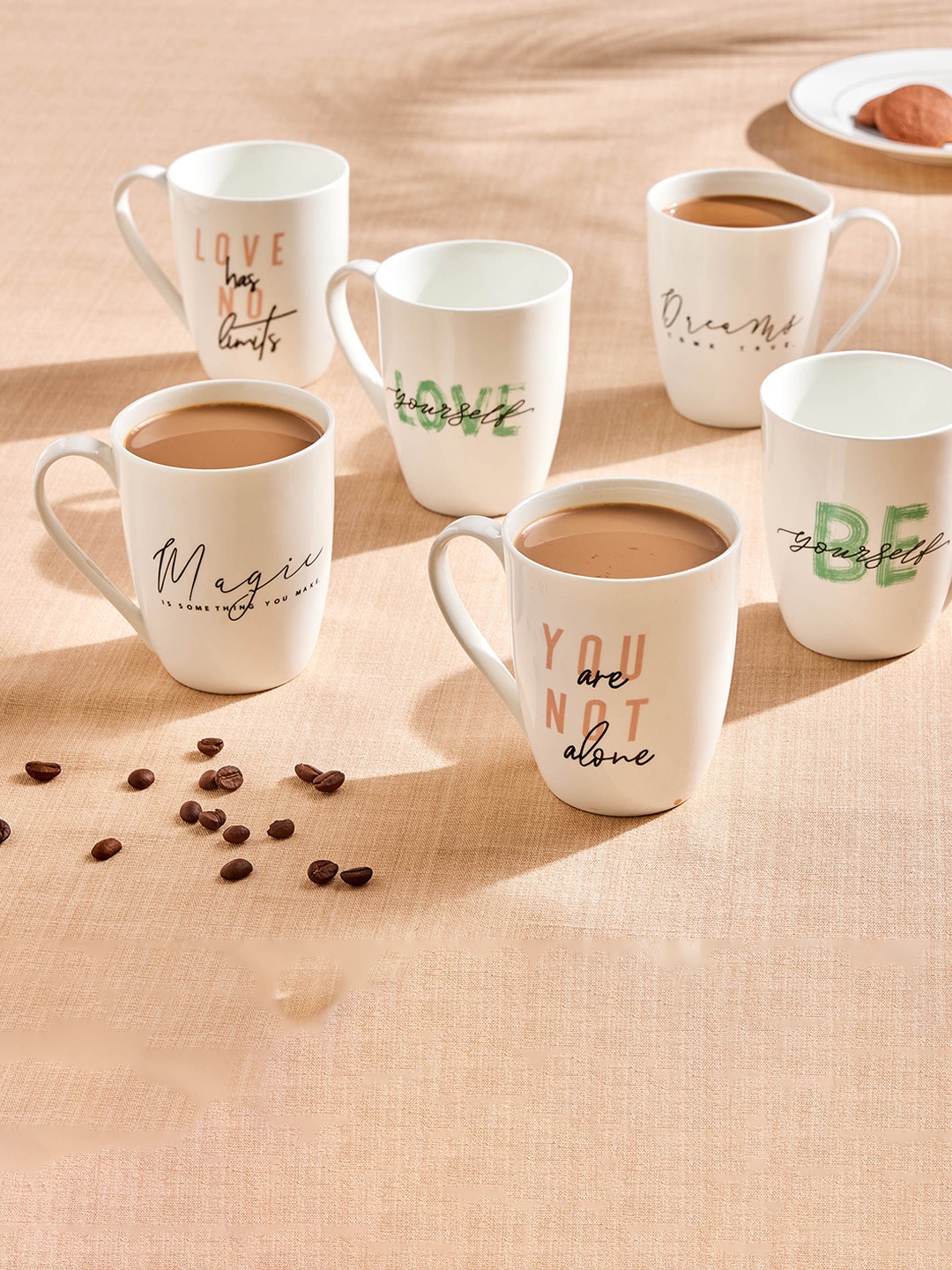 

Home Centre White & Black Printed Bone China Matte Coffee Mug 340 ml