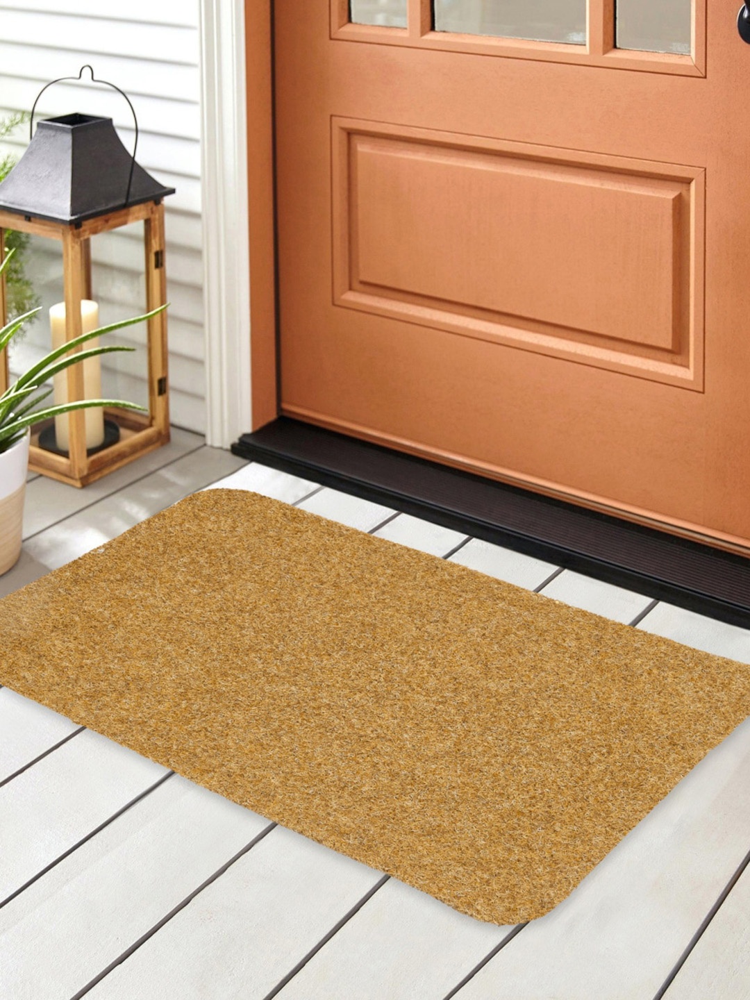 

Home Centre Fiesta Beige Textured Doormat