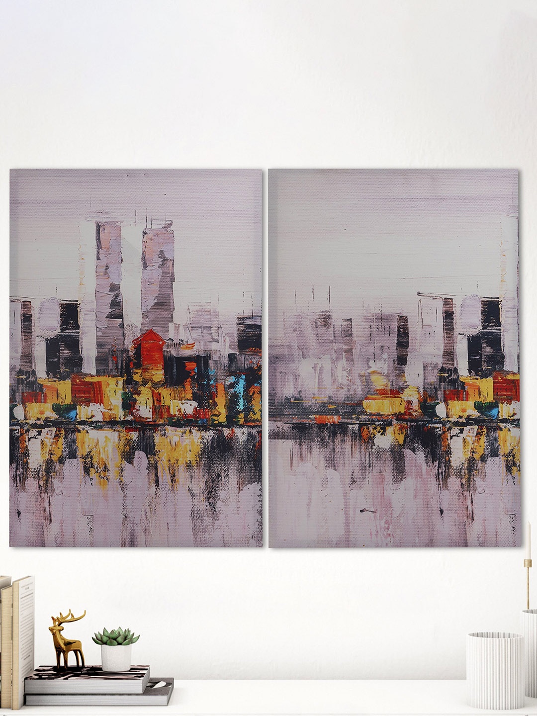 

Home Centre Purple and Yellow 2 Pieces City Scape-Painted Framed Wall Art