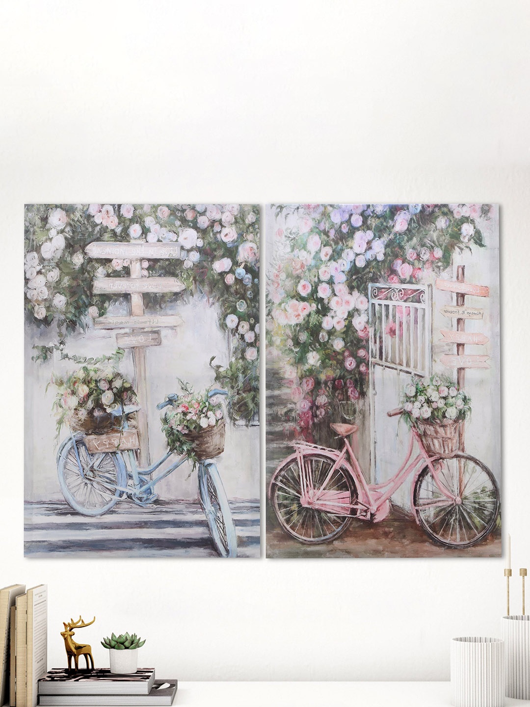 

Home Centre Brezza Pink & Blue 2 Pieces Flower And Bicycle-Painted Framed Wall Art