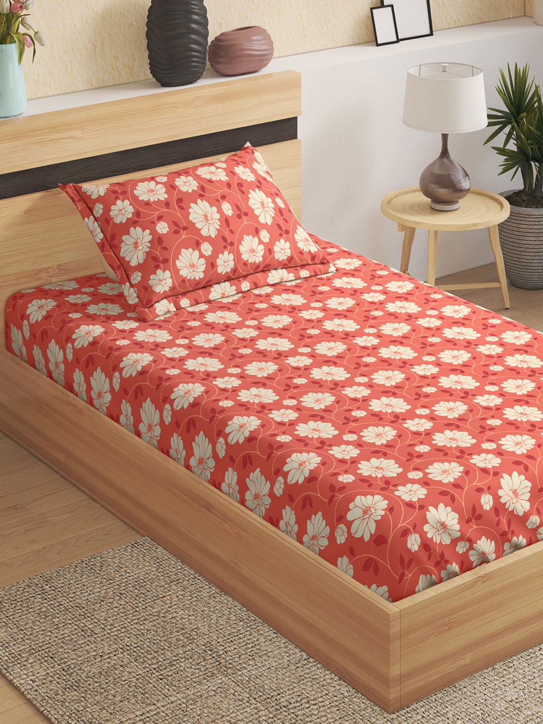 

Home Centre Pacific Juniper Orange Floral 104 TC Fitted Single Bedsheet & 1 Pillow Cover