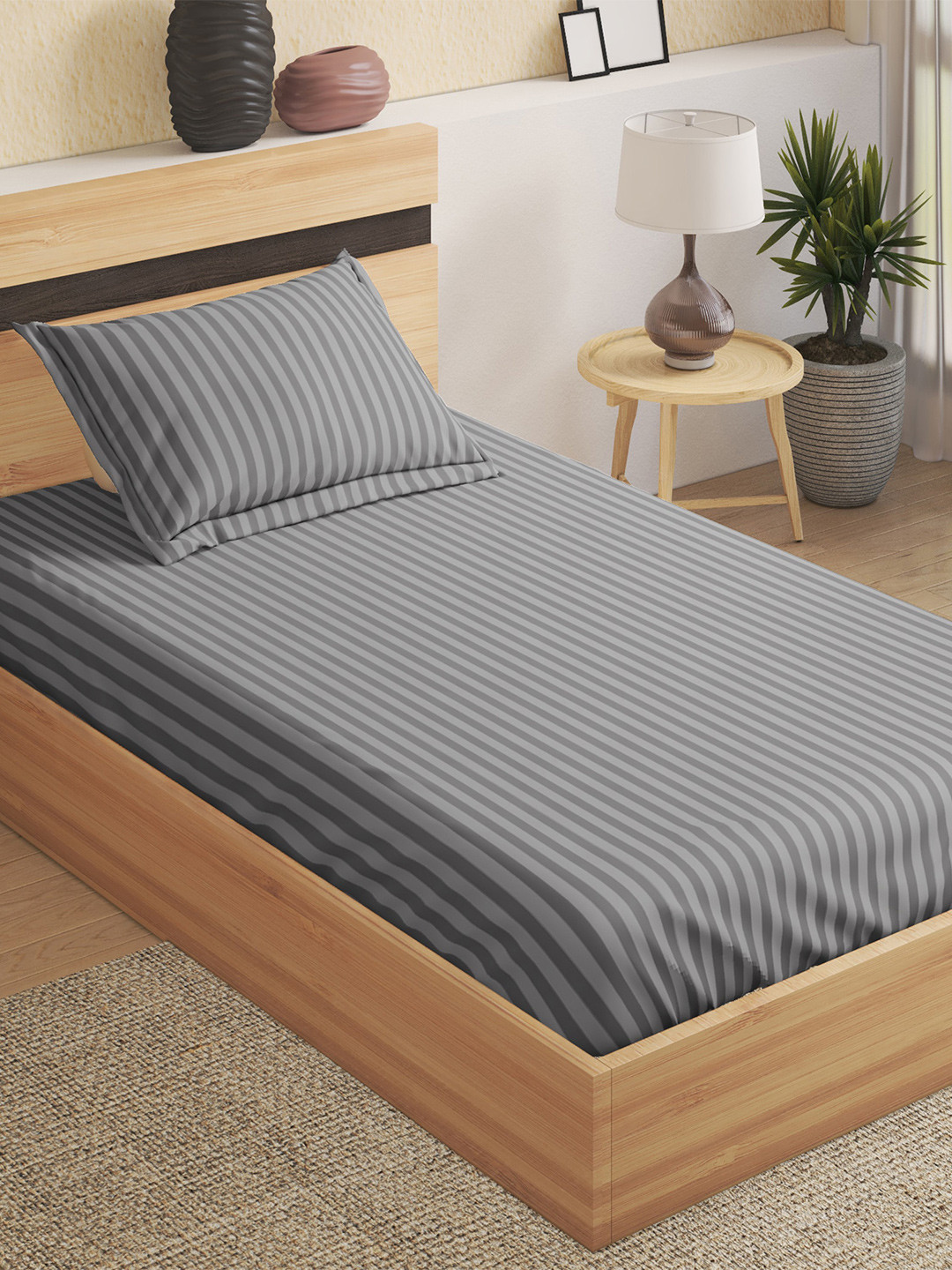 

Home Centre Pacific Juniper Grey Striped 144 TC Fitted Single Bedsheet With 1 Pillow Cover