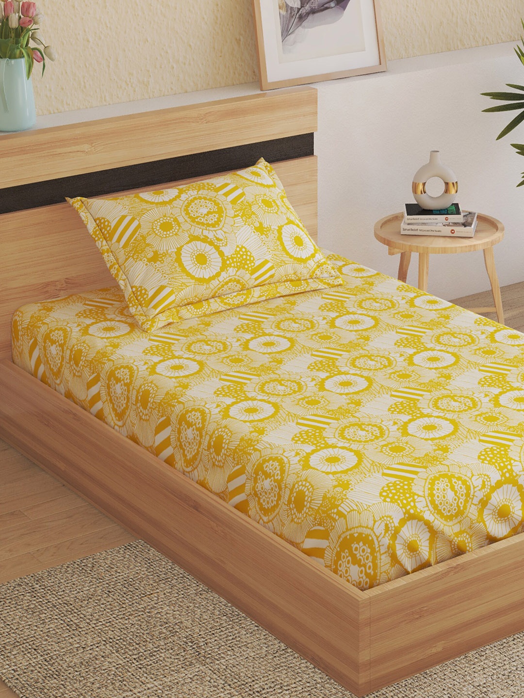 

Home Centre Dallas Yellow & White Printed Cotton 144 TC Single Bedsheet & 1 Pillow Cover
