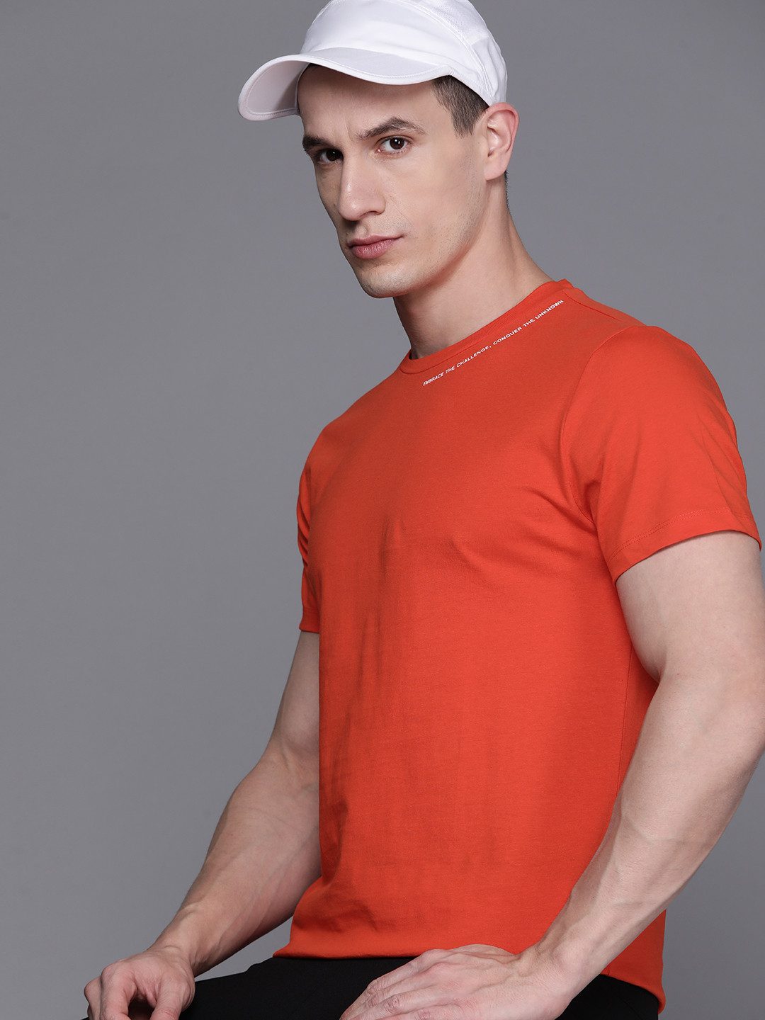 

HRX by Hrithik Roshan Men Solid Pure Cotton T-shirt, Orange