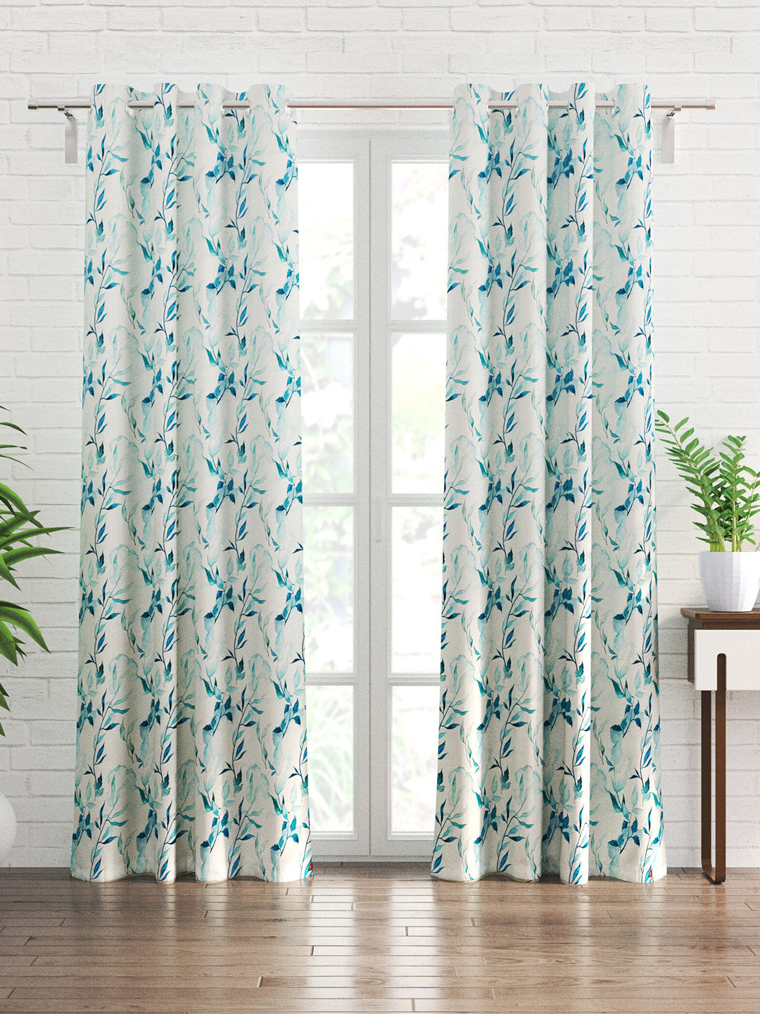 

Home Centre Fiesta White & Blue 2 Pieces Floral Black Out Door Curtains