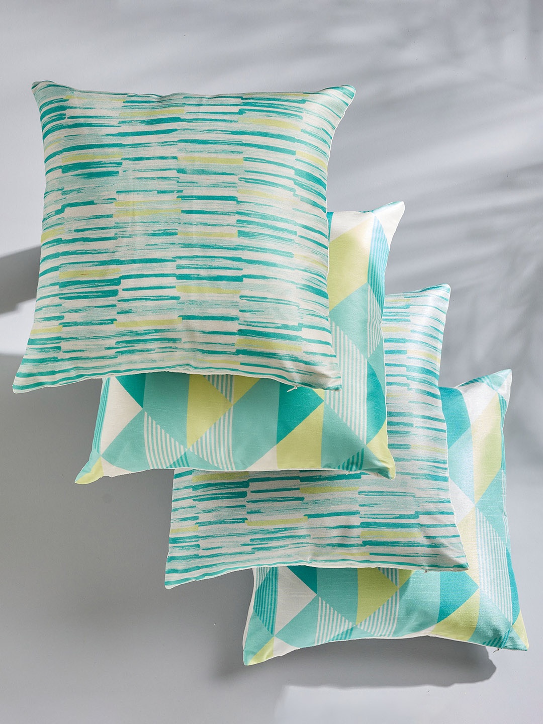 

Home Centre Spinel Teal & Yellow 4 Pieces Geometric Square Cushion Covers