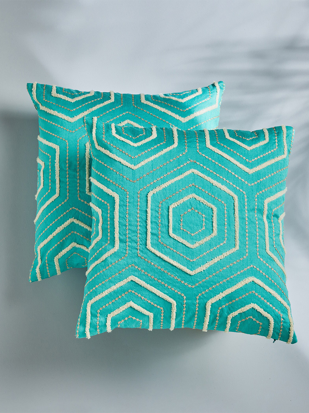 

Home Centre Adam Teal & White 2 Pieces Geometric Square Cushion Covers