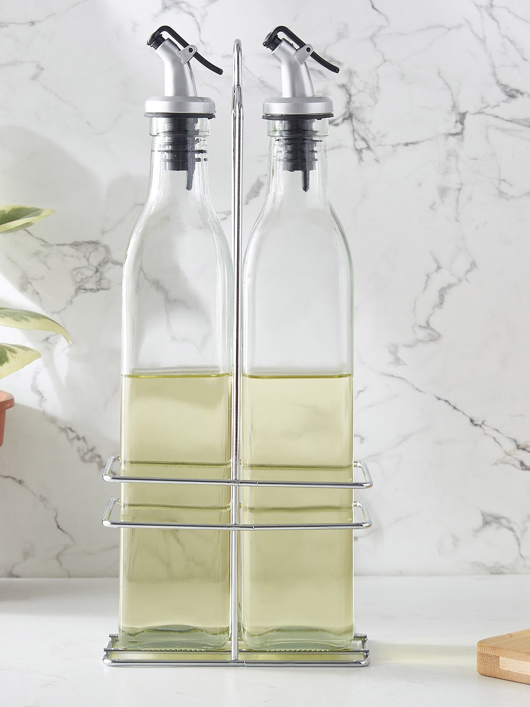 

Home Centre Pacific Blithe Transparent & Silver-Toned 2Pcs Glass Oil Dispenser 500 Ml each