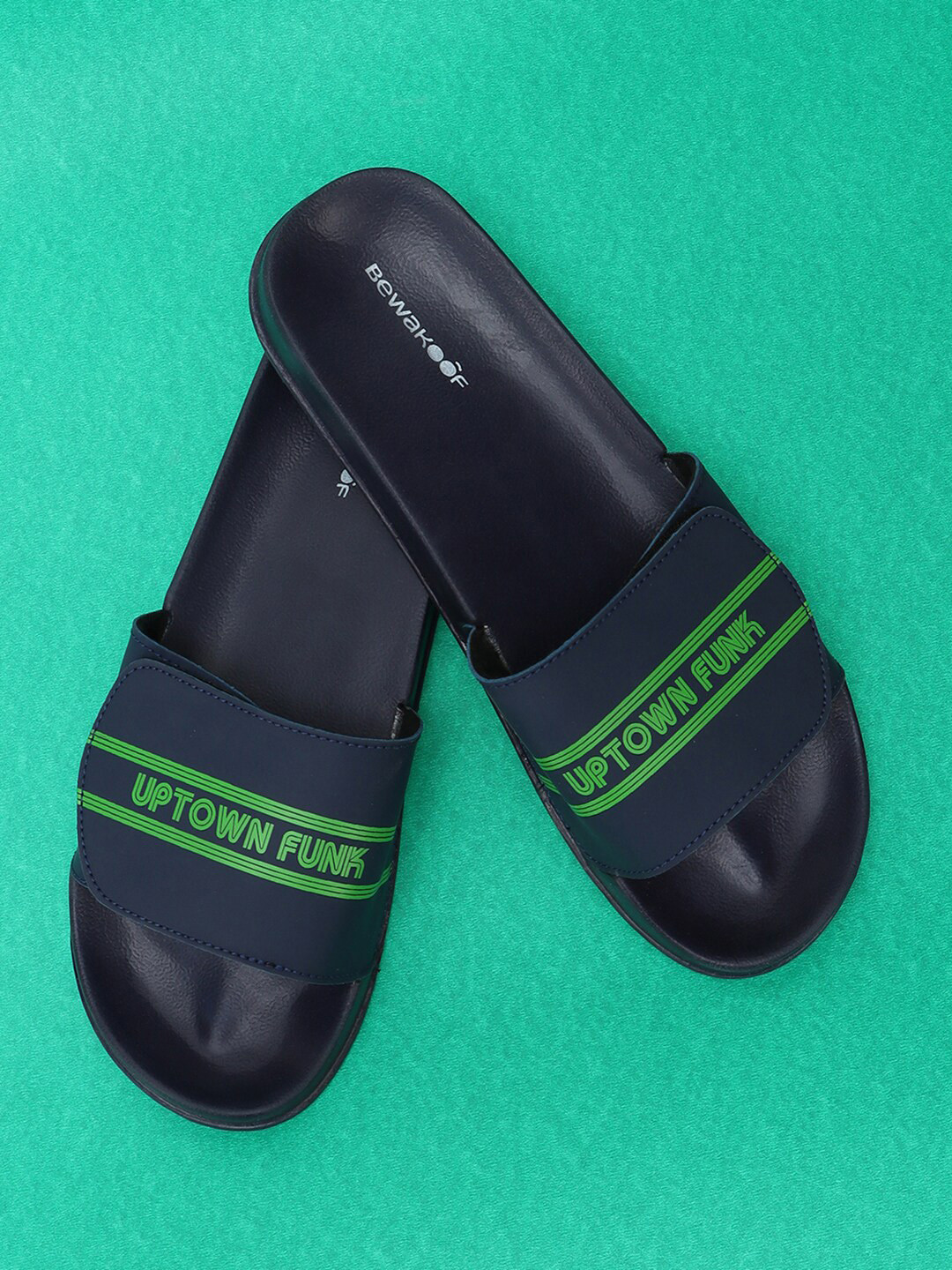 

Bewakoof Men Navy Blue And Green Printed Rubber Sliders