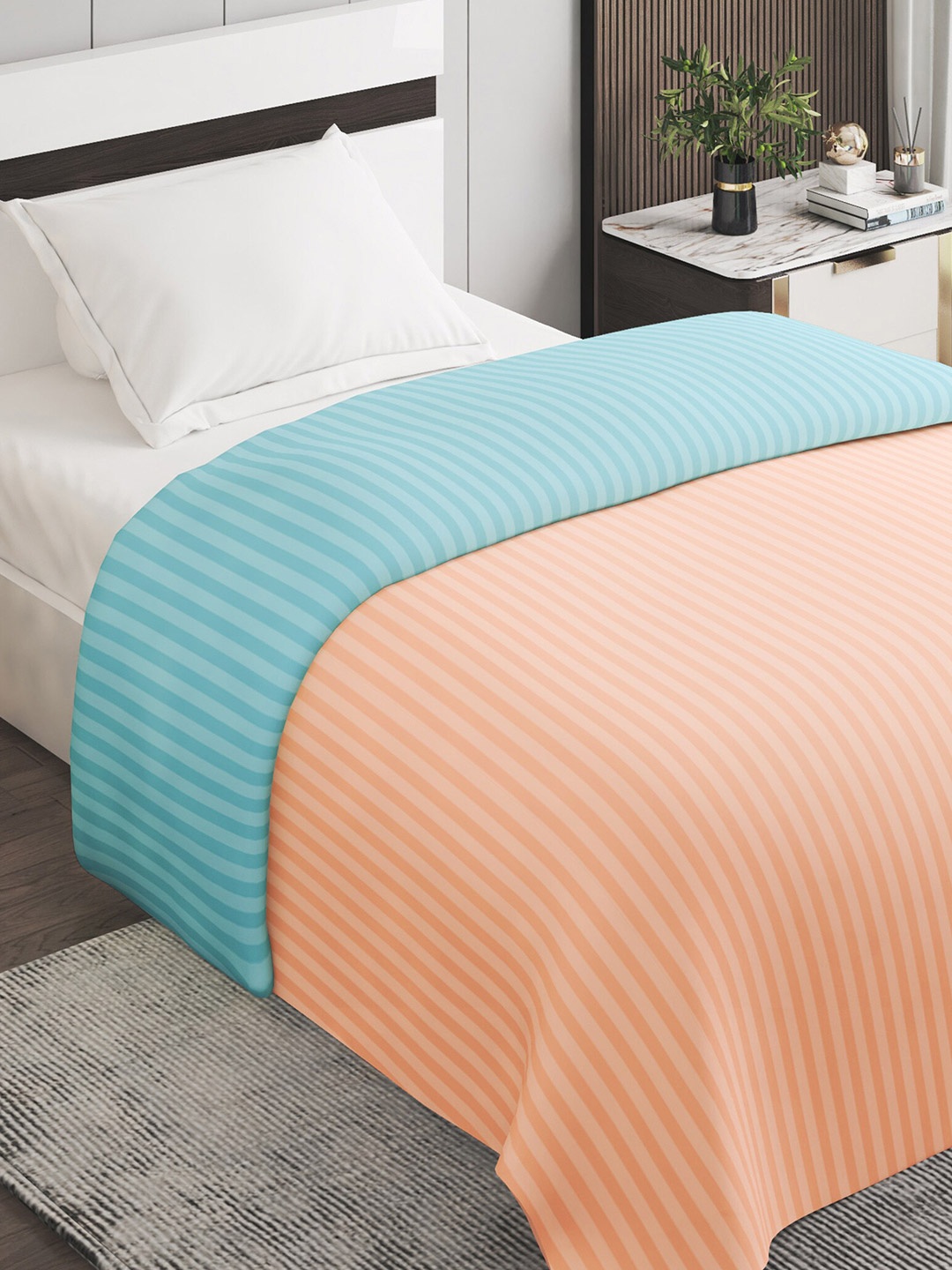 

Home Centre Peach-Coloured & Blue Striped Microfiber Mild Winter 150 GSM Single Bed Comforter