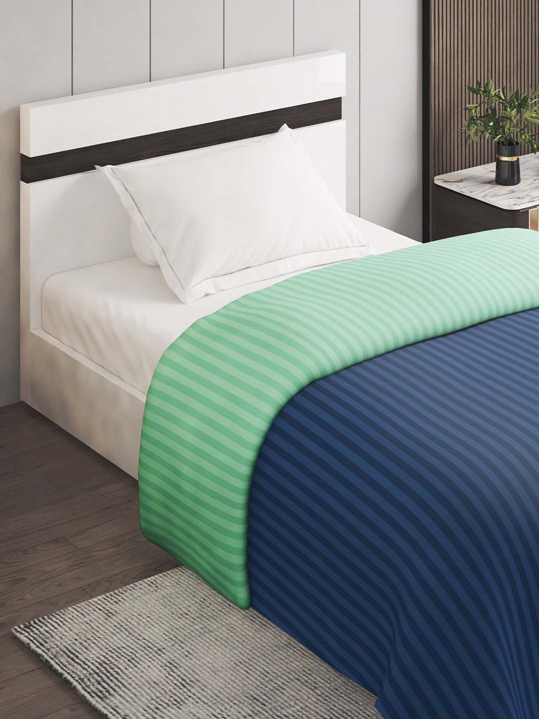 

Home Centre Pacific Juniper Navy Blue Striped 150 GSM Reversible Double Bed Comforter