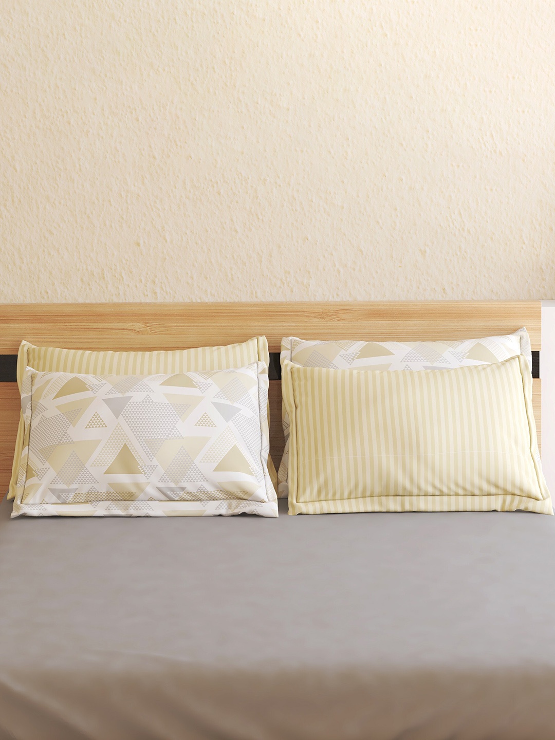 

Home Centre Pacific Juniper 4-Pcs White & Yellow Geometric Printed Pillow Covers