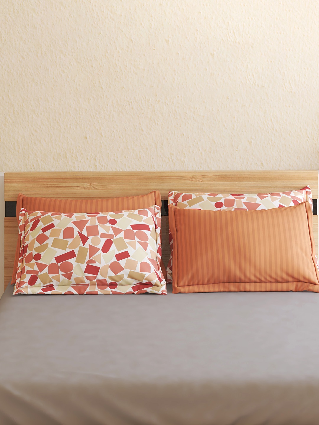 

Home Centre Pacific Juniper Orange-Colored & White 4-Pieces Printed Pillow Covers
