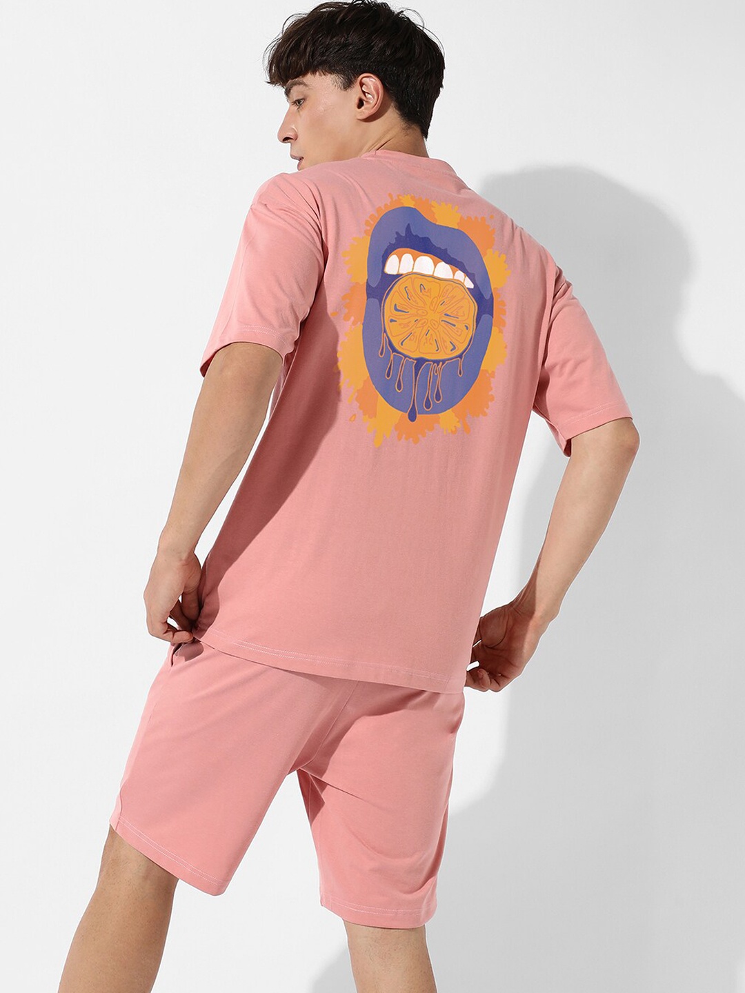 

Campus Sutra Peach-Coloured Printed Round Neck Oversized Tshirt With Shorts