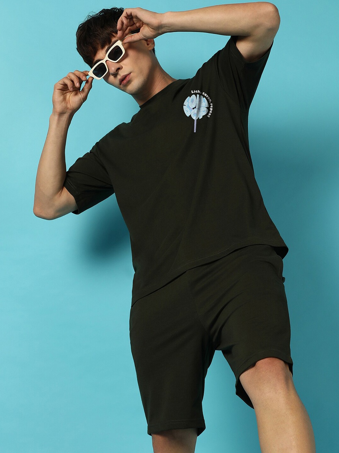 

Campus Sutra Olive Green Printed Oversized T-Shirt & Shorts