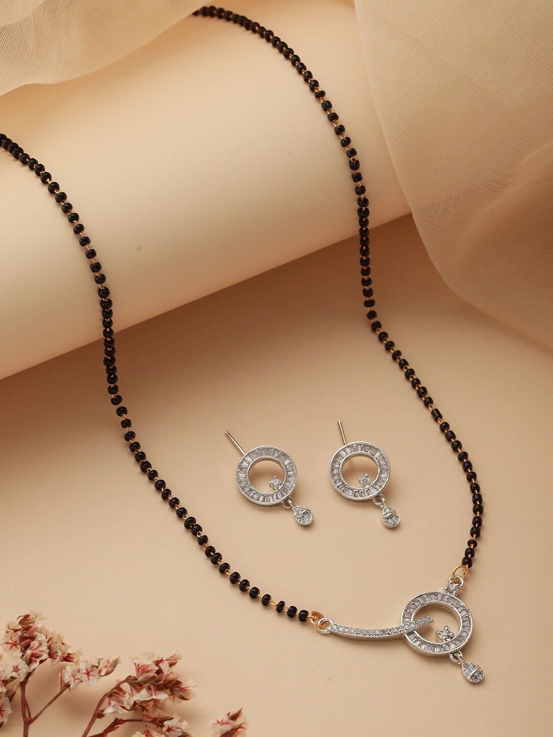 

Jazz and Sizzle Rhodium-Plated AD Stone-Studded & Beaded Mangalsutra With Earrings, Silver