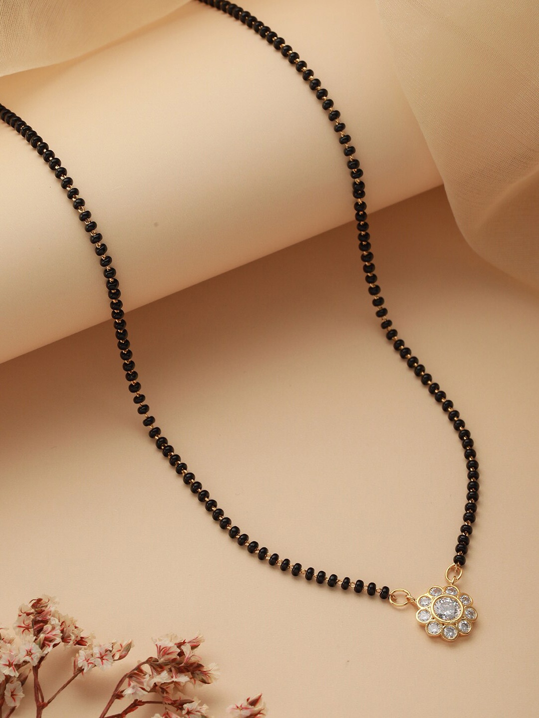 

Jazz and Sizzle Gold-Plated White CZ Stone-Studded & Black Beaded Mangalsutra