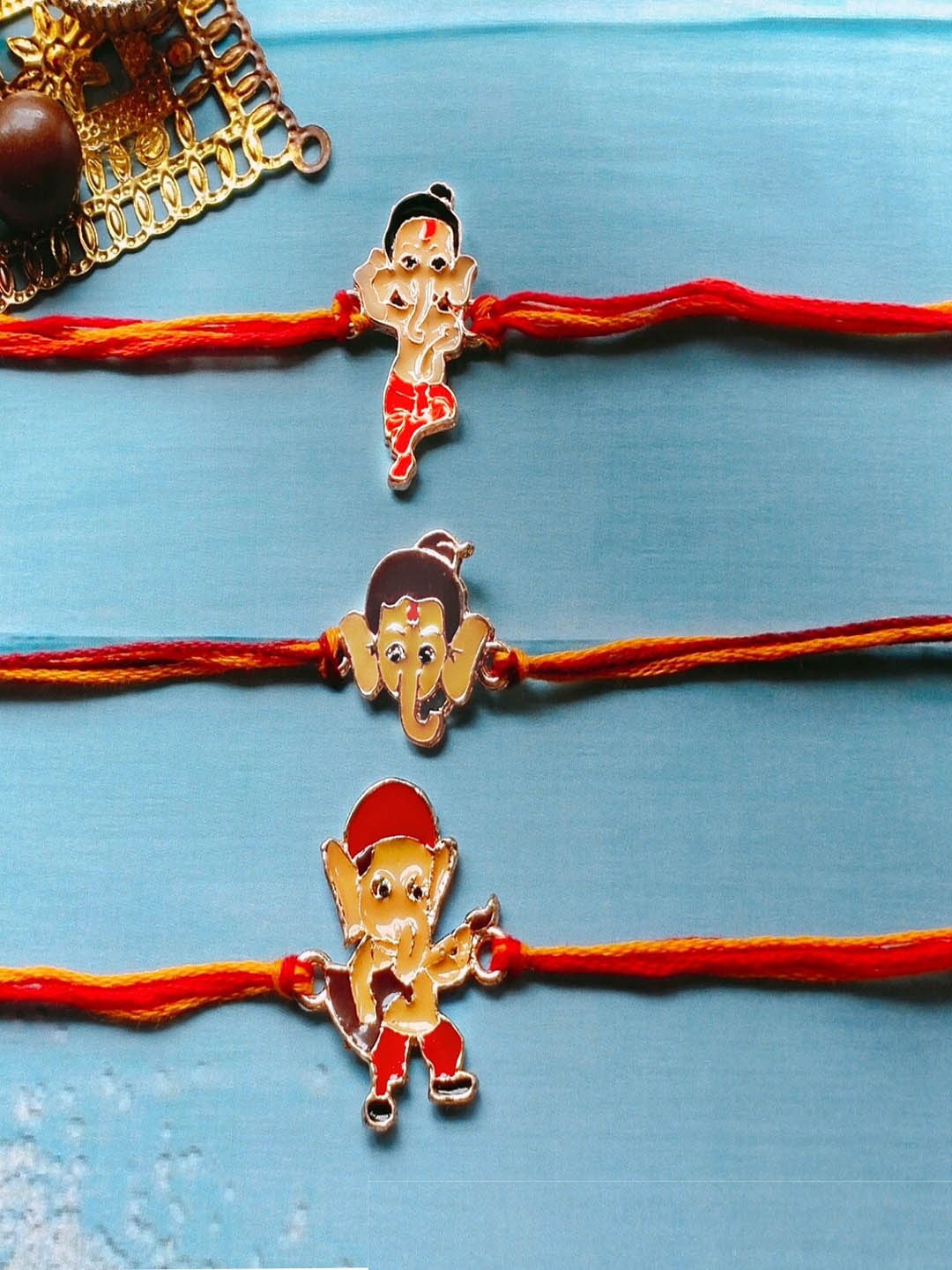 

Mahi Set of 3 Ganesha CharmRakhi, Beige