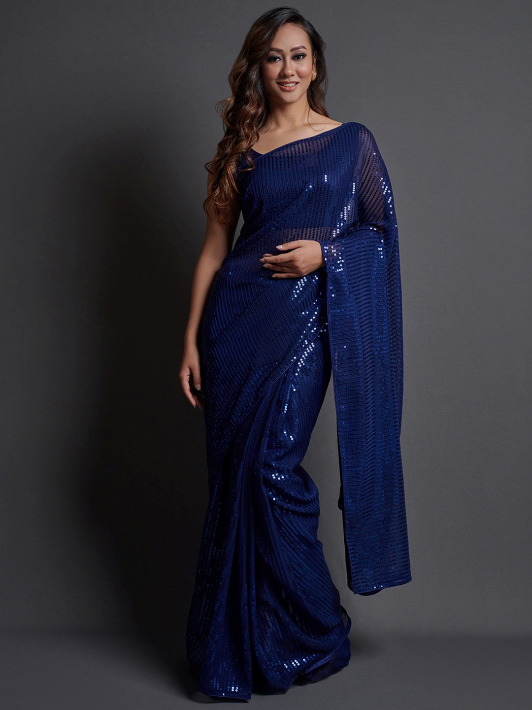 

Satrani Blue Geometric Embroidered Sequined Poly Georgette Saree