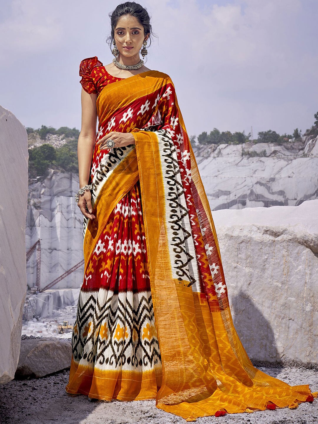 

Mitera Maroon & Mustard Ethnic Motifs Printed Saree